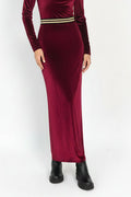 Red velvet skirt with gold trim
